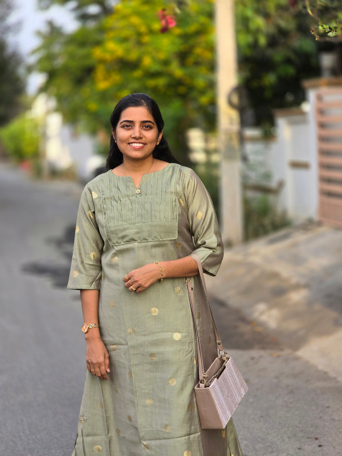 Elechi green A- line Butta with lining kurti set