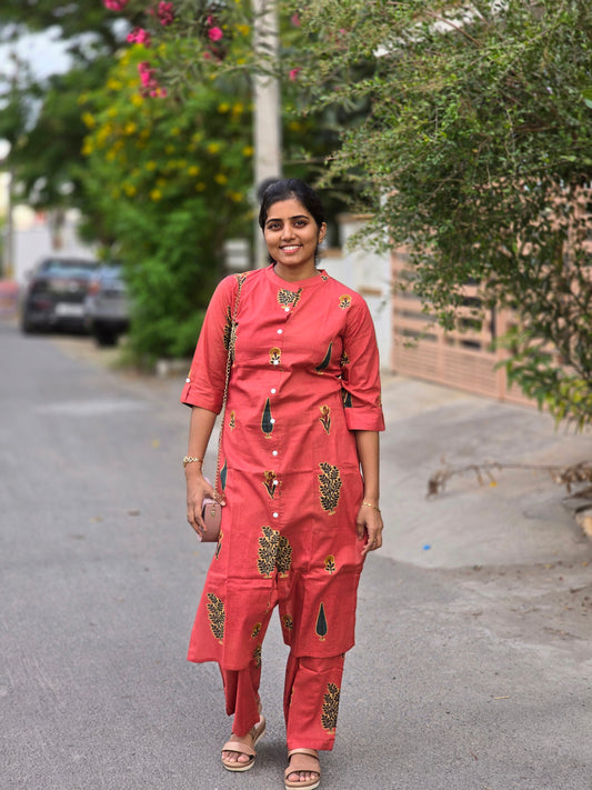 Orange with green leaves kurti set