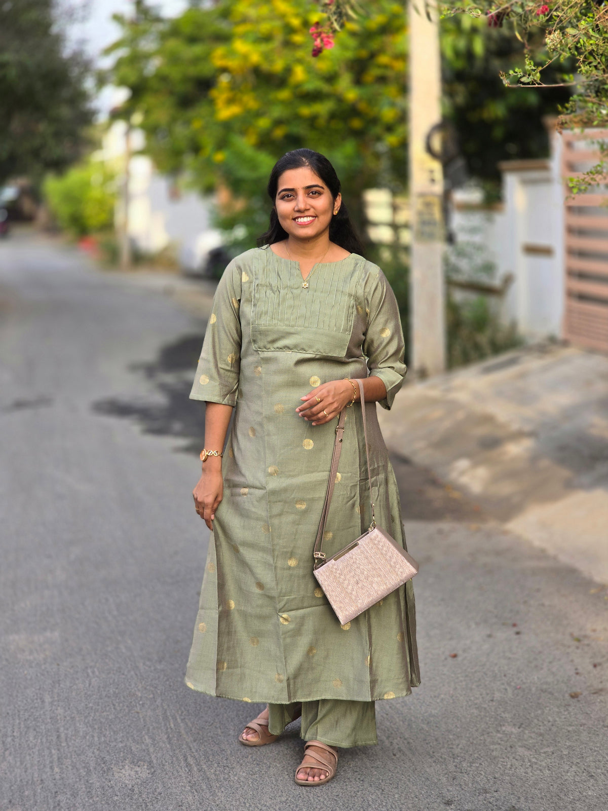 Elechi green A- line Butta with lining kurti set