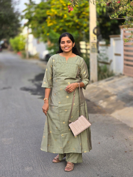 Elechi green A- line Butta with lining kurti set