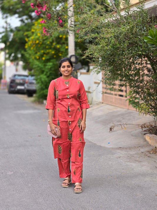 Orange with green leaves kurti set